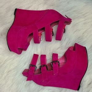 Bright pink platform shoes